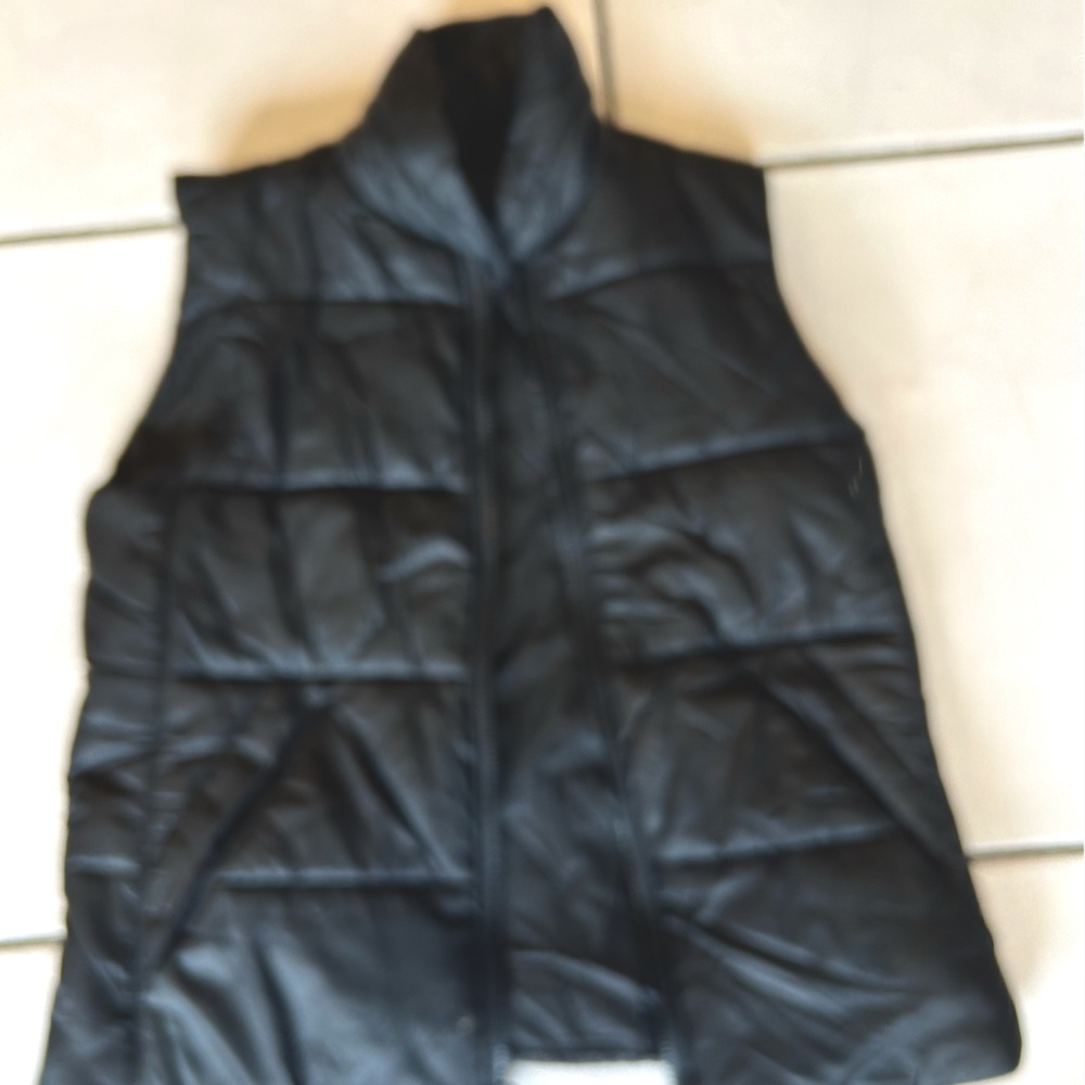 Black zippered vest